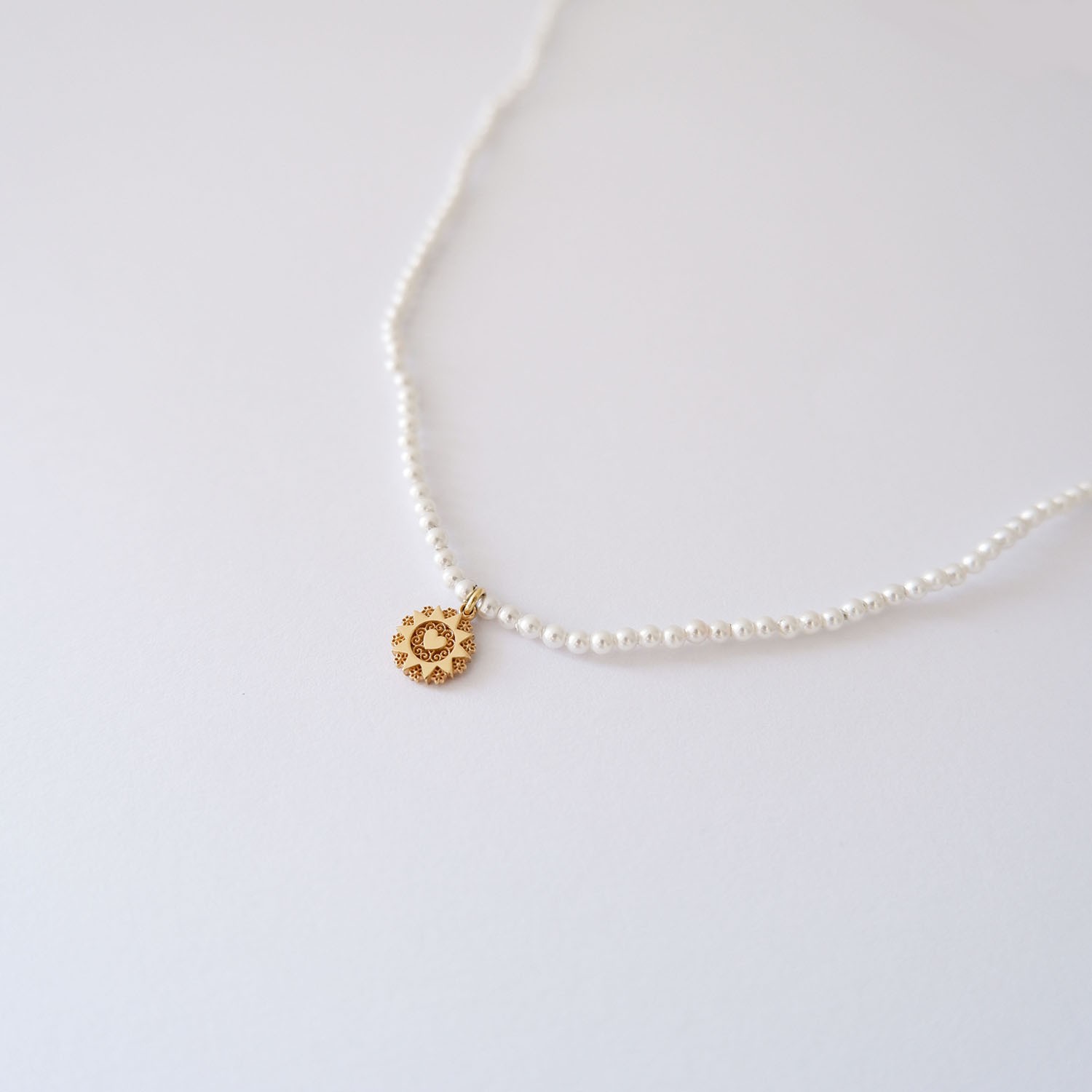 Filo Mini Presentosa 1 Cuore in oro 18kt e perline