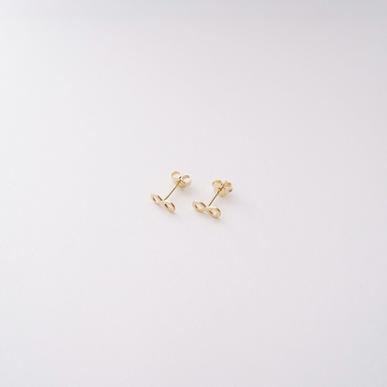 Orecchini Infinito in Oro giallo 18 Kt