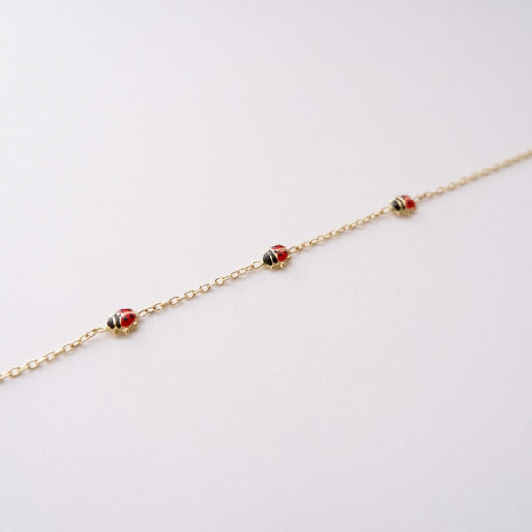 Bracciale Bimba Coccinelle in oro 18kt e smalto colorato