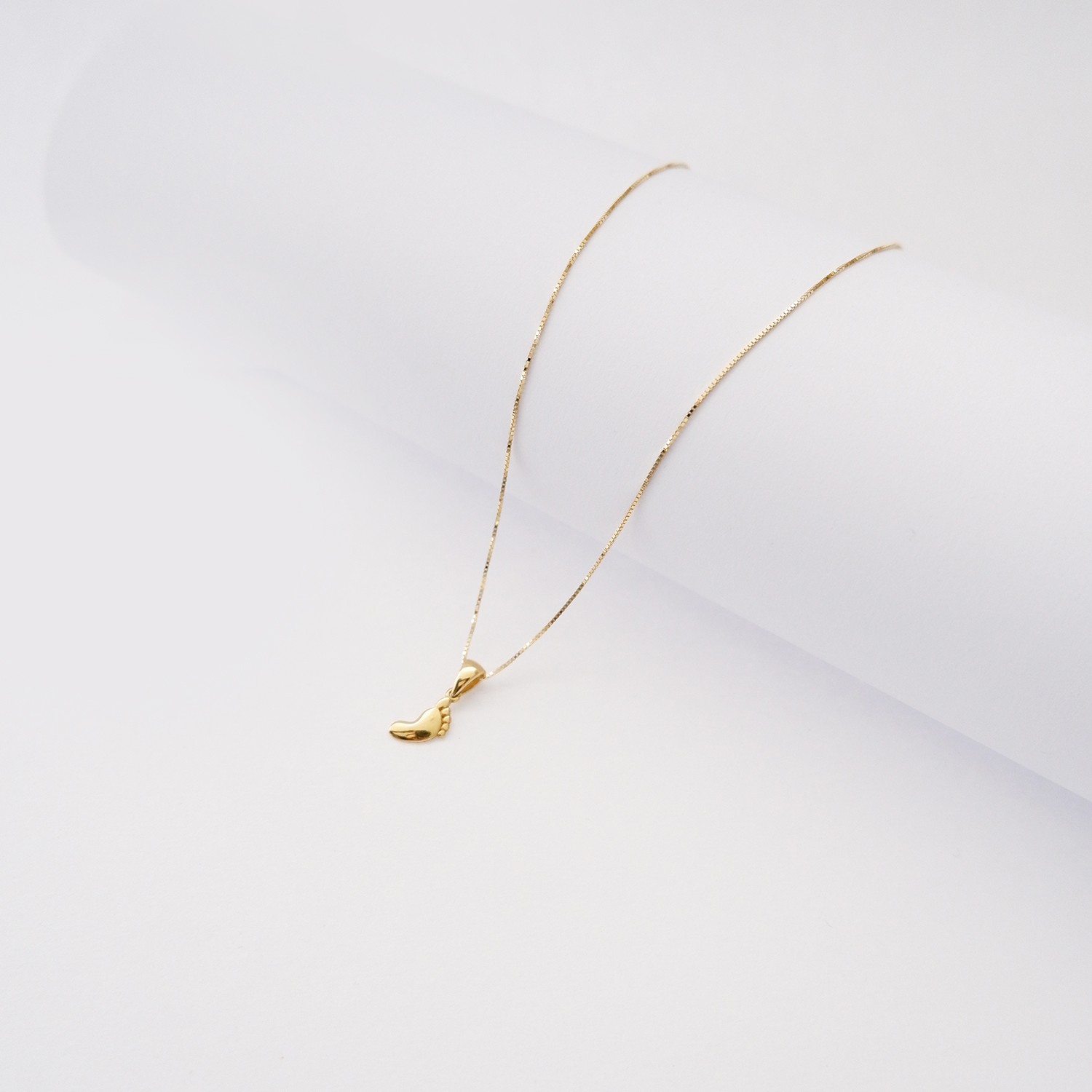 Collana Piedino in oro giallo 18kt