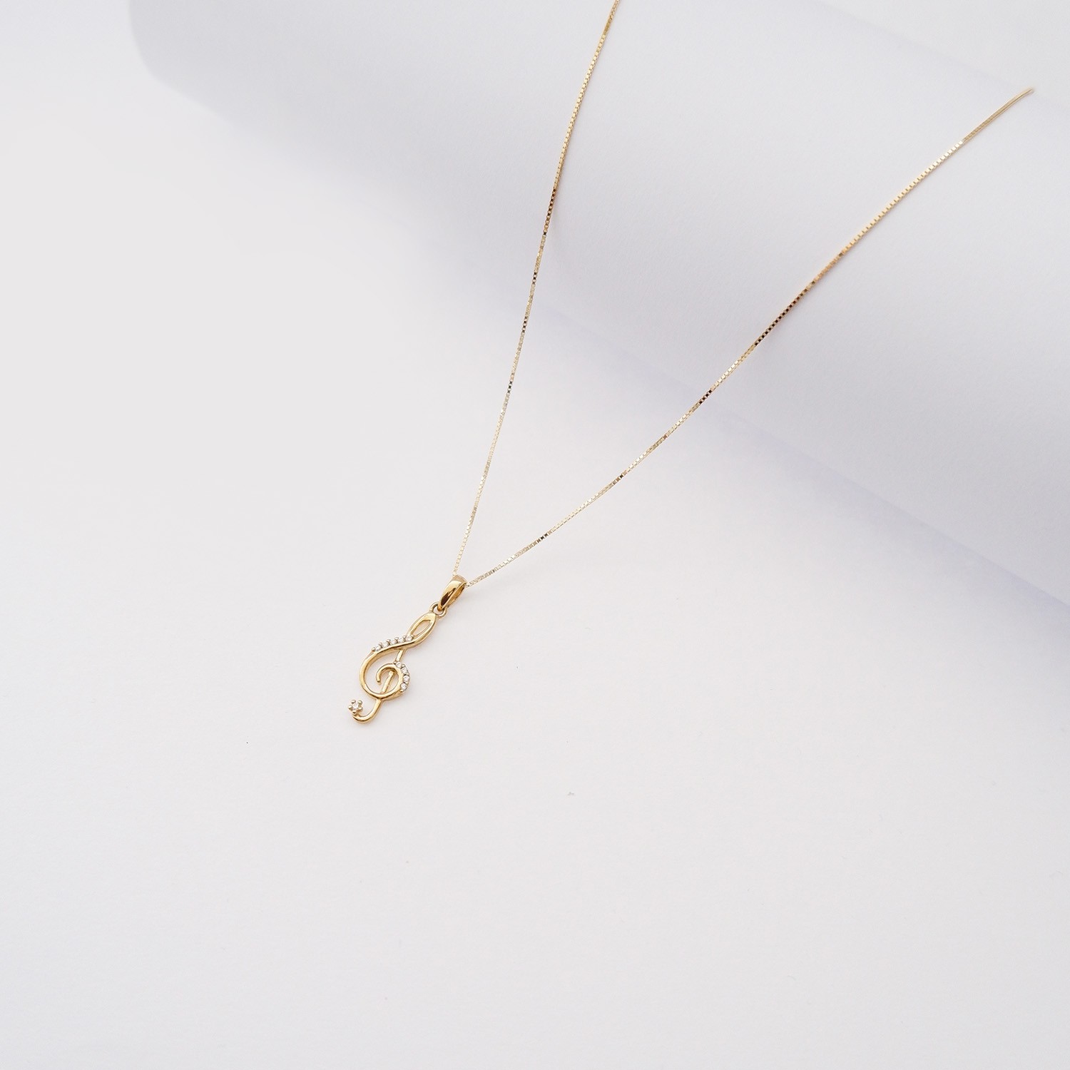 Collana Chiave di Violino in oro giallo 18kt e zirconi