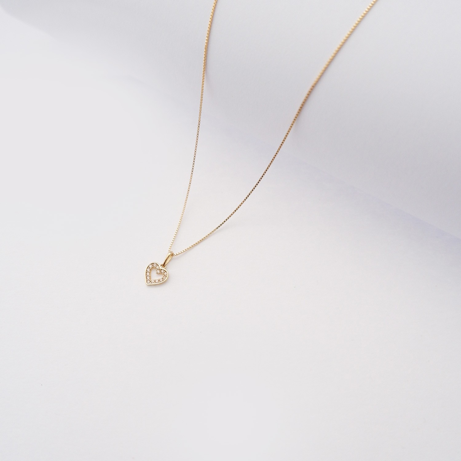 Collana Mini Cuoricino in oro giallo 18kt e zirconi